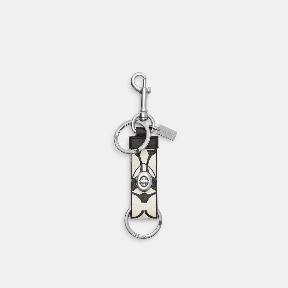 Coach Outlet Trigger Snap Bag Charm In Signature Canvas 7231247745084